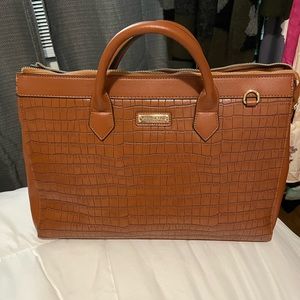 Cognac color faux crocodile.